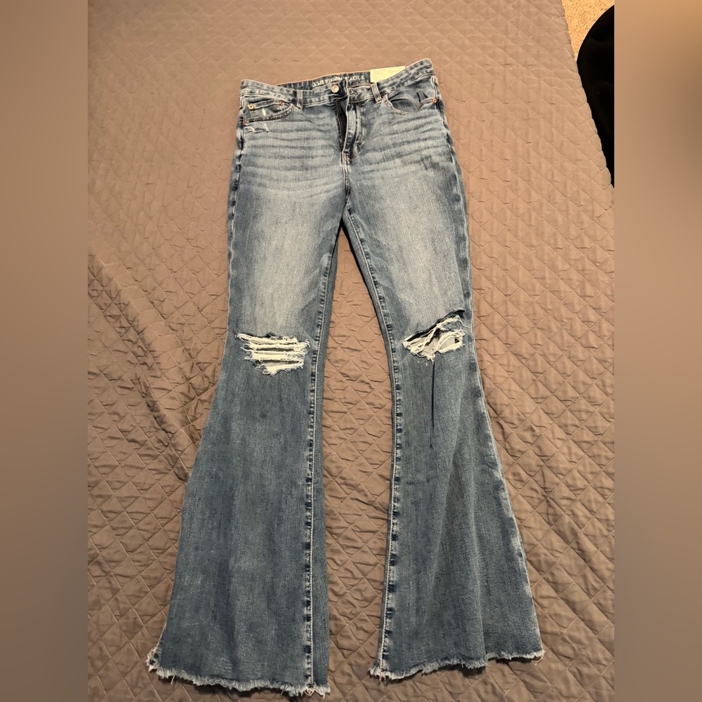 Women’s bell bottom Jeans distressed size 12 Long